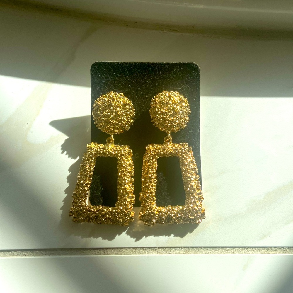 Beautiful gold pageant earrings
